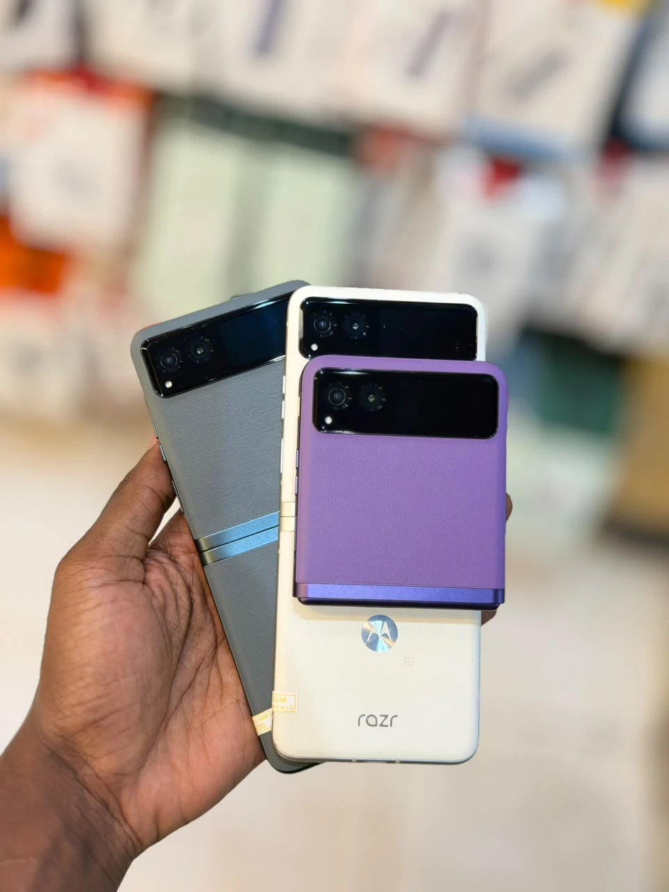 Motorola Razr 40s pre-owned foldable phone stock, shown folded from the rear