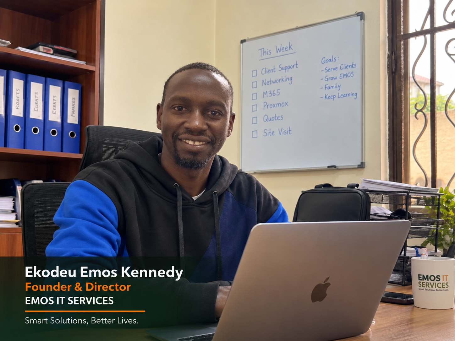 Official office photograph of Ekodeu Emos Kennedy, Founder & Director of EMOS IT SERVICES